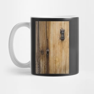 Grainy wooden door. Mug